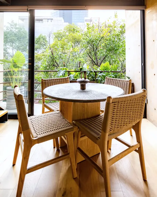 LUUM, A table by the open balcony